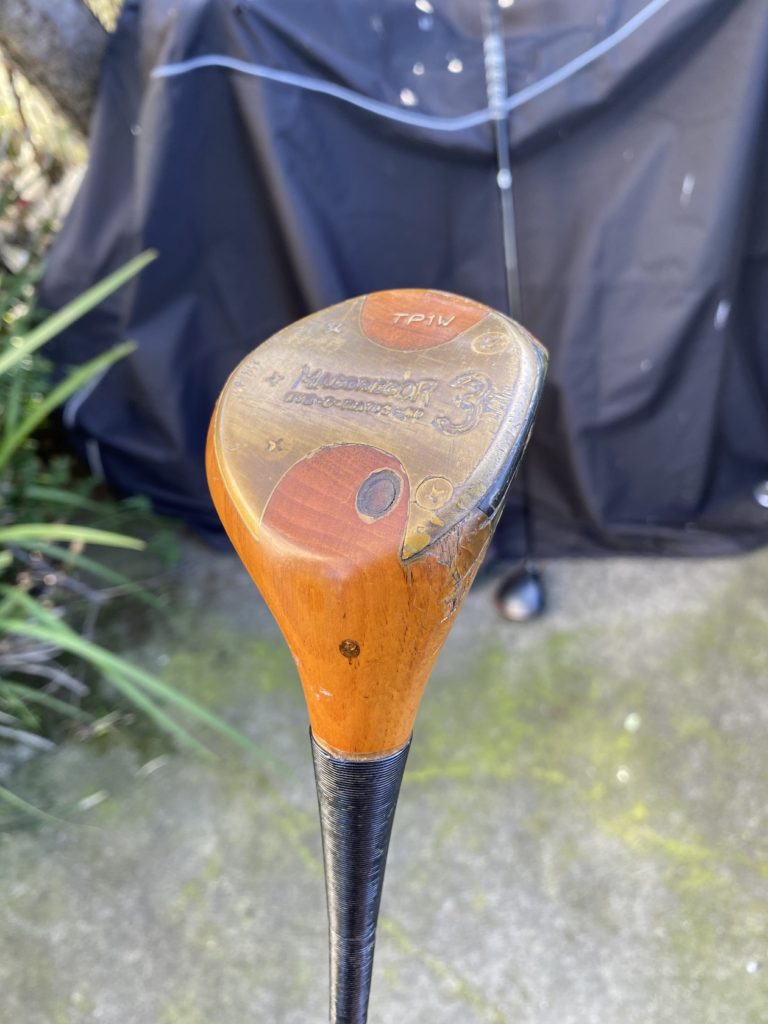 bottom of a persimmon fairway wood