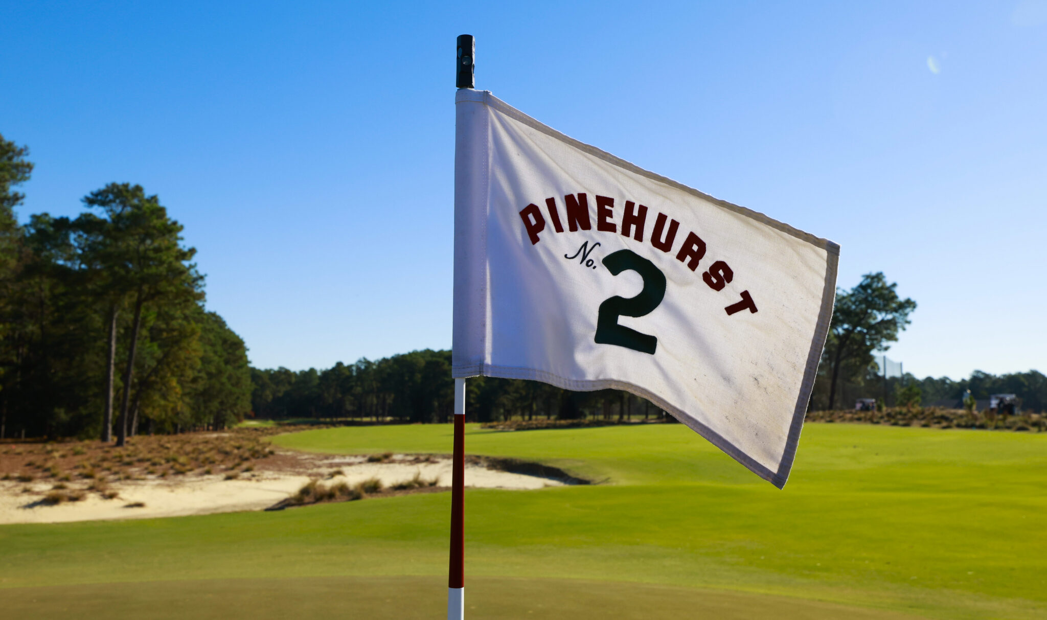 A detailed view of the hole 18 flag on Course No. 2 is seen before the 2023 USGA Partner Summit at Pinehurst Country Club in Pinehurst, NC on Monday, Oct. 23, 2023. (Copyright USGA/Jason E. Miczek)