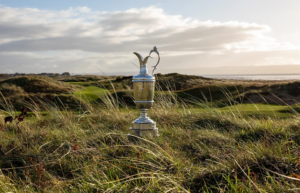 The Claret Jug in a sea of grass at Royal Troon golf course.